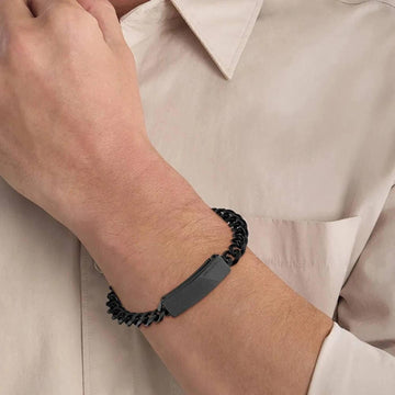 Ανδρικό βραχιόλι Calvin Klein 35000418 κατασκευασμένο από ατσάλι σε μαύρο χρώμα με σχέδιο μπρασελέ και μαύρο μαγνητικό κούμπωμα.